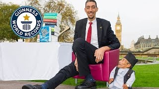 Tallest and shortest men meet for the first time  Guinness World Records Day 2014 [upl. by Aihsele]