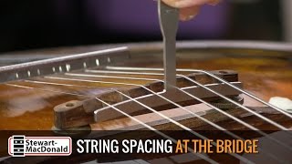 Setting guitar string spacing at the bridge [upl. by Namielus]