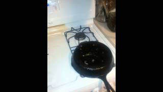 How to cook a frozen pizza on stove [upl. by Enimsay620]