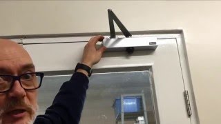 How To Adjust An Overhead Door Closer [upl. by Yrrum682]