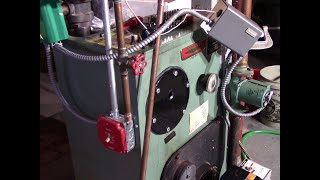 Removing tankless coil from boiler and replacing with blank cover plate [upl. by Vacla]