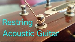 How To Restring An Acoustic Guitar Properly [upl. by Annaerda]