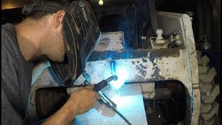 Welding a Bobcat loader [upl. by Eilssel]