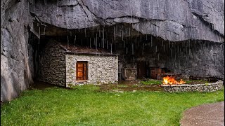 Build a warm shelter under a large rock in the rain forest hunt and cook [upl. by Aiza]