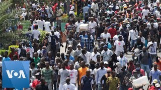 Thousands Rally in Haiti Against President Moise [upl. by Mcgaw912]